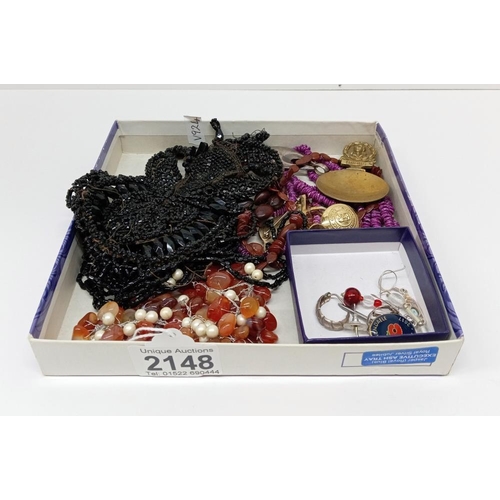 2148 - A quantity of costume jewellery including cufflinks, earrings & necklaces etc.