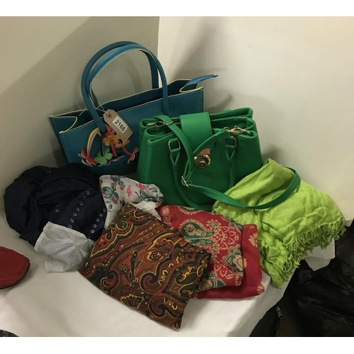 2166 - A collection of scarves (x5) and handbags (x2)