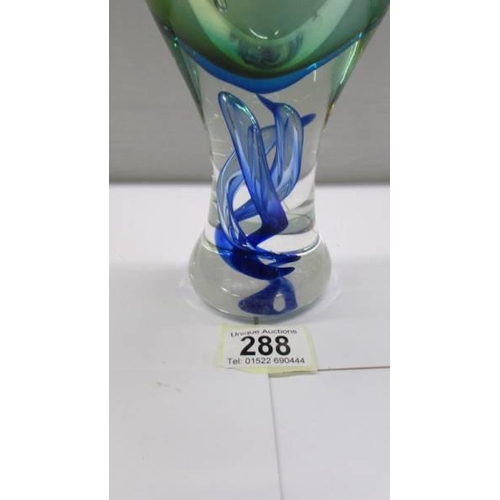 288 - A good heavy studio glass vase with twist in stem.