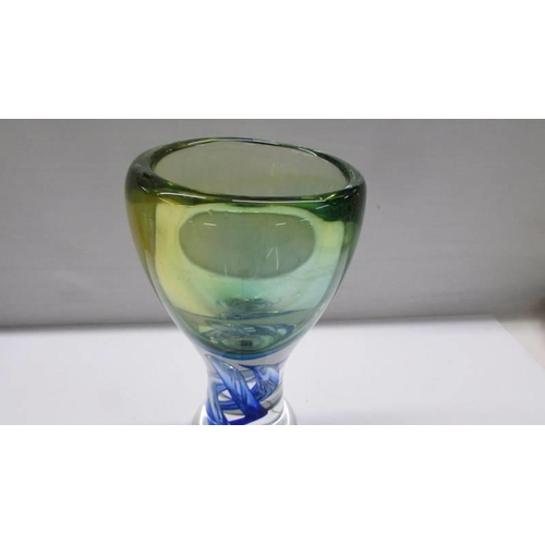 288 - A good heavy studio glass vase with twist in stem.