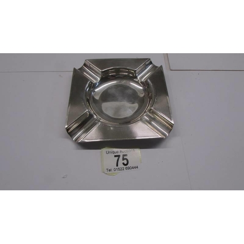 75 - A silver ashtray hallmarked for Birmingham, 80 grams.