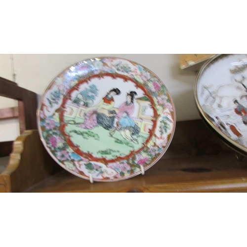 298 - A 19th century Chinese dish and two Chinese plates.