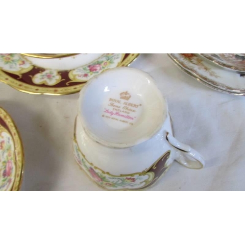 303 - Sixteen pieces of Royal Albert 'Lady Hamilton' pattern tea ware, COLLECT ONLY.