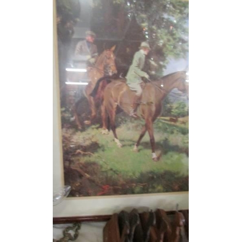 334 - A framed and glazed picture depicting horse riders and deer. COLLECT ONLY.