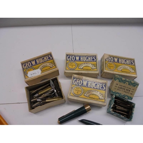 85 - Three fountain pens, five boxes of nibs etc.,