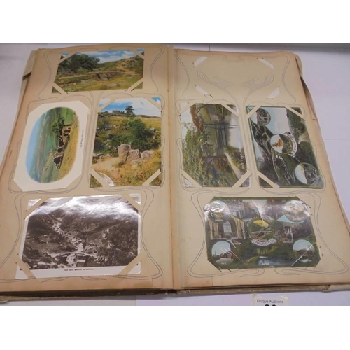 86 - An album of approximately 150 early 20C postcards and a scrap book mainly relating to the Bronte's.