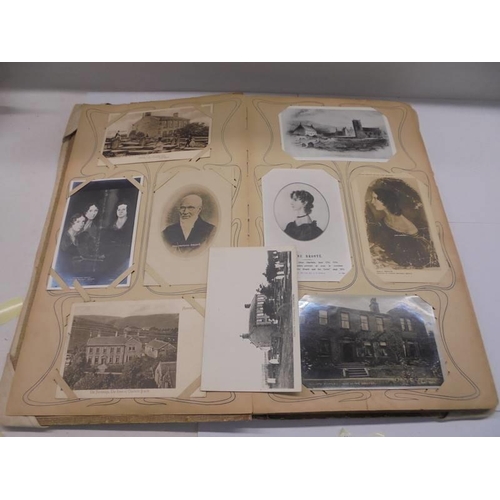 86 - An album of approximately 150 early 20C postcards and a scrap book mainly relating to the Bronte's.