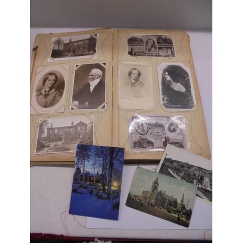 86 - An album of approximately 150 early 20C postcards and a scrap book mainly relating to the Bronte's.