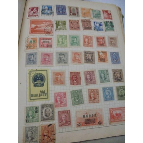 96 - Three Swiftsure albums of world stamps.