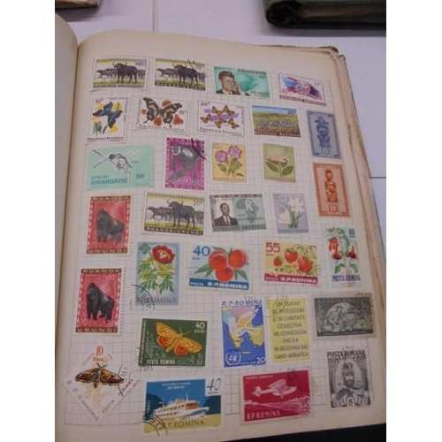 96 - Three Swiftsure albums of world stamps.