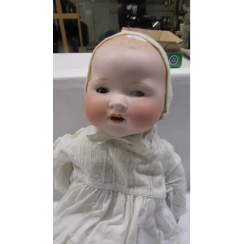 131 - A German Armand Marseille Dream baby doll, (Hands a/f).