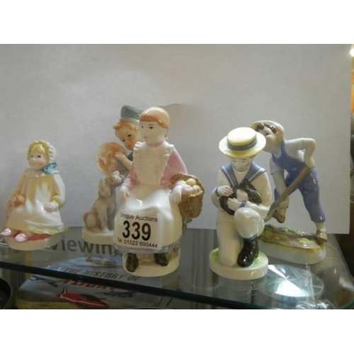 339 - A collection of 20th century ceramic figures.