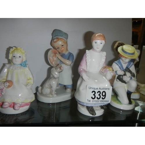 339 - A collection of 20th century ceramic figures.