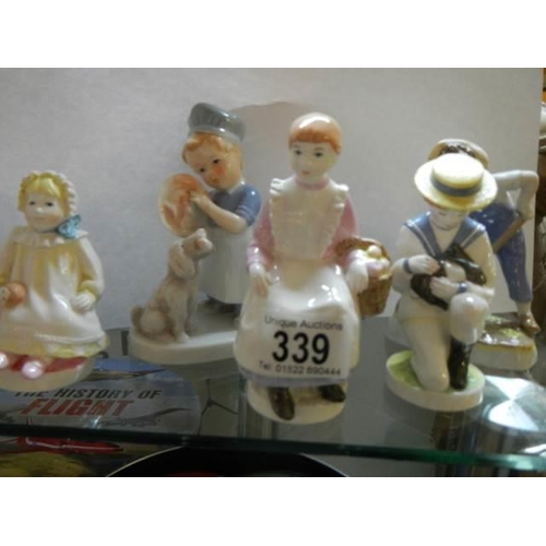 339 - A collection of 20th century ceramic figures.