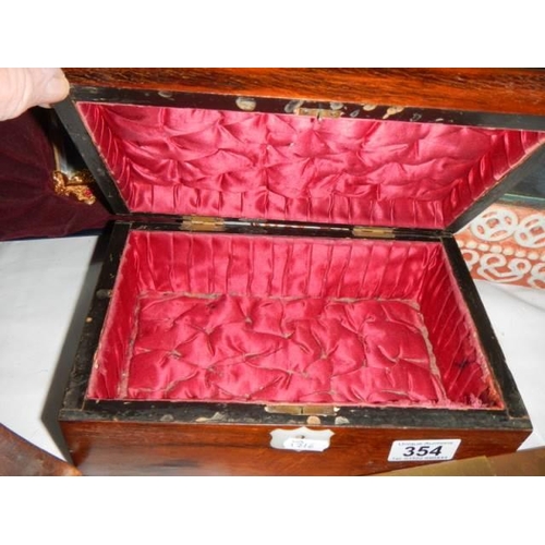 354 - A mahogany inlaid jewellery box.