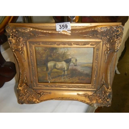 359 - A gilt framed study of a horse.