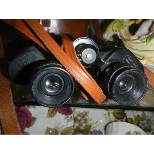 380 - A cased pair of French Denhill 8 x 30 binoculars, J A Dave & son, London.