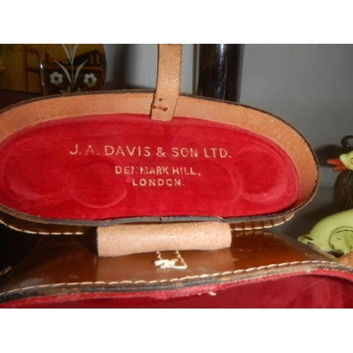 380 - A cased pair of French Denhill 8 x 30 binoculars, J A Dave & son, London.