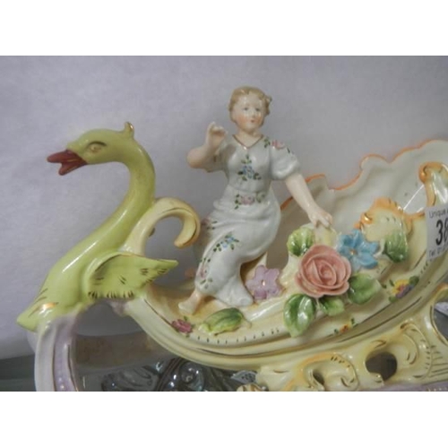 381 - A porcelain cabinet piece of a swan carriage.