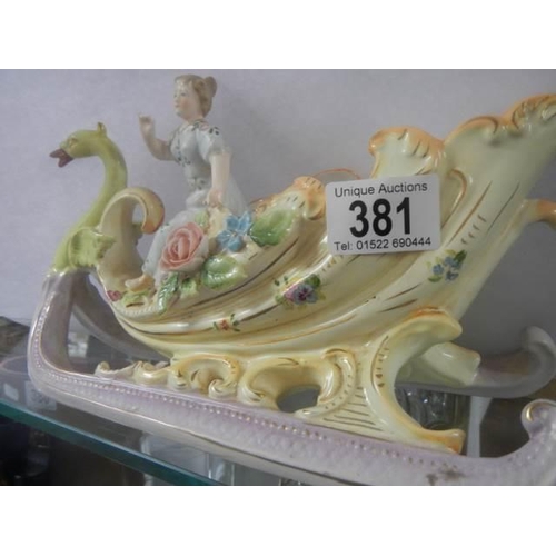 381 - A porcelain cabinet piece of a swan carriage.