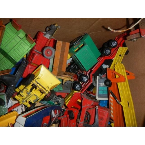 392 - A box of old die cast and other toysl