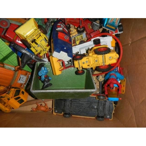 392 - A box of old die cast and other toysl