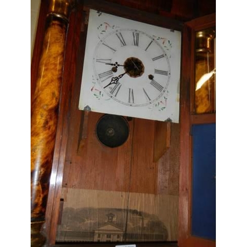 490 - An old American wall clock, missing weights. COLLECT ONLY.