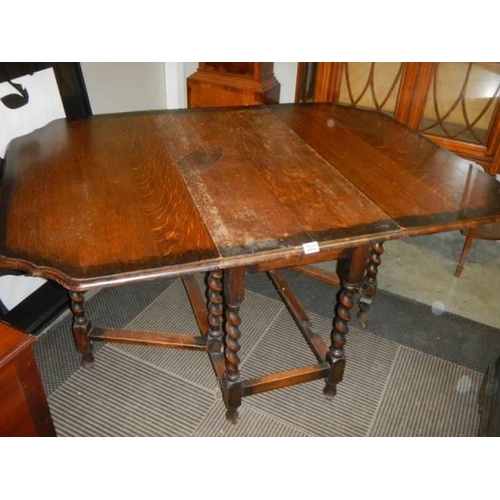 503 - A good oak barley twist gateleg table with pie crust edge, COLLECT ONLY.