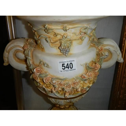 540 - A Grecian style ceramic urn.