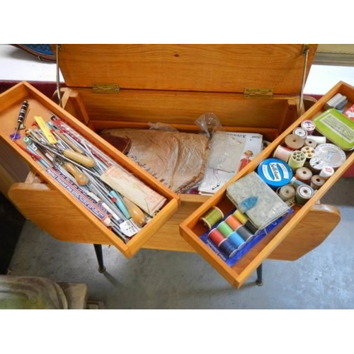 545 - A good quality retro style sewing box with inner shelves complete with contents. COLLECT ONLY.