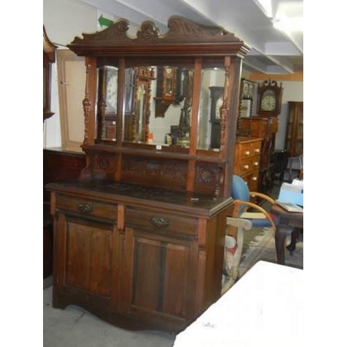 578 - An early 20th century mirror backed dresser, COLLECT ONLY.