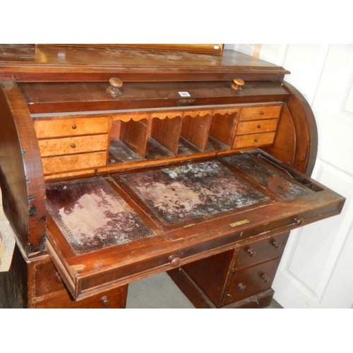 582 - A late Victorian double pedestal dome top desk with pull-out slide. COLLECT ONLY.