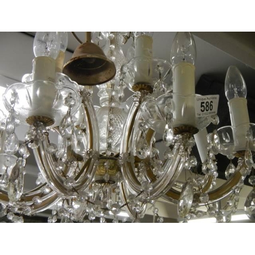 586 - A good quality 8 light chandelier, COLLECT ONLY.