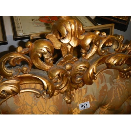 621 - A mid 20th century gilded and deep buttoned head board, COLLECT ONLY.