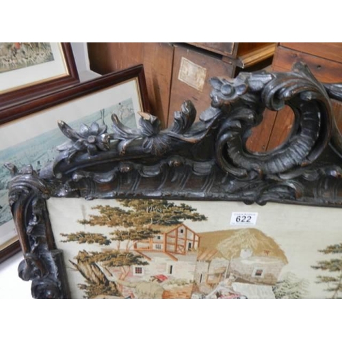 622 - A late Victorian carved oak pole screen, some damage. COLLECT ONLY.