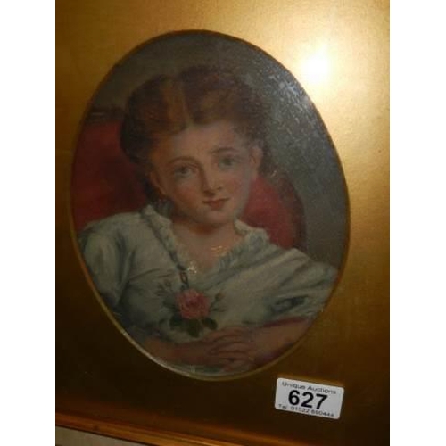 627 - A gilt framed and glazed portrait of a young lady, COLLECT ONLY.