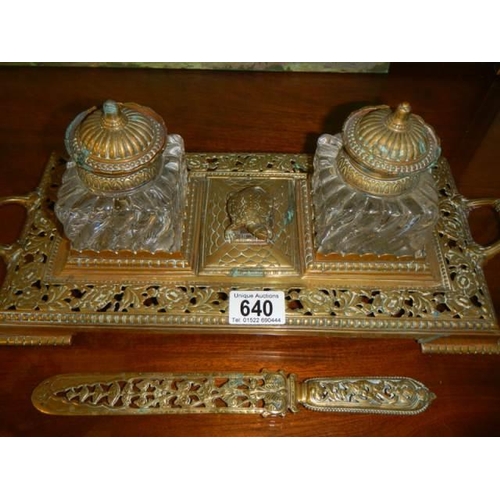 640 - A Victorian brass ink stand with letter opener.