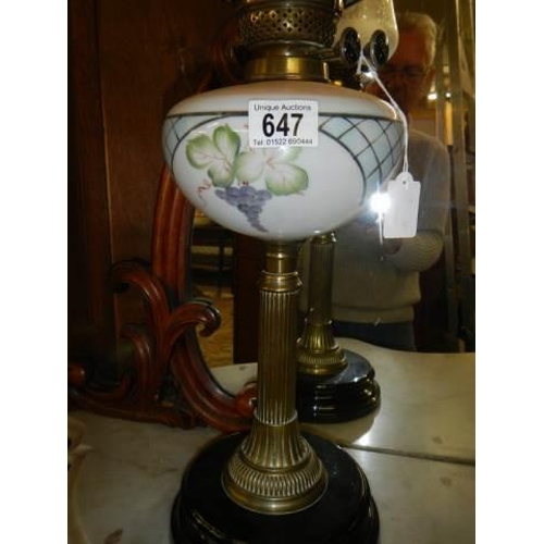 647 - A Victorian oil lamp with brass column and glass font, COLLECT ONLY.