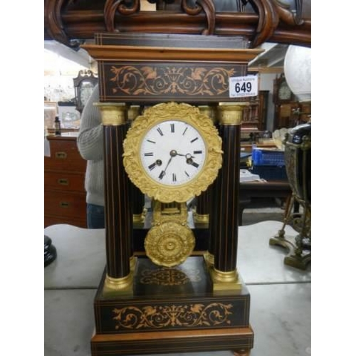 649 - A French four pillar mantel clock, complete. COLLECT ONLY.