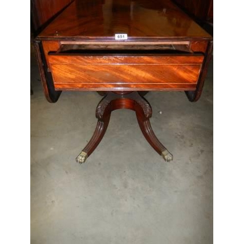 651 - A Victorian single pedestal mahogany Pembroke table with one drawer and brass castors, COLLECT ONLY.