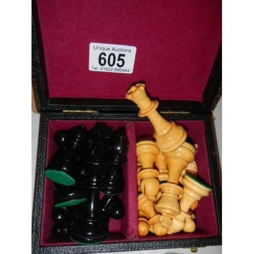 605 - A chess set complete with board.