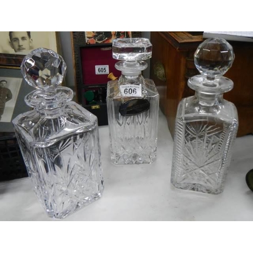 606 - Three good cut glass decanters. COLLECT ONLY.