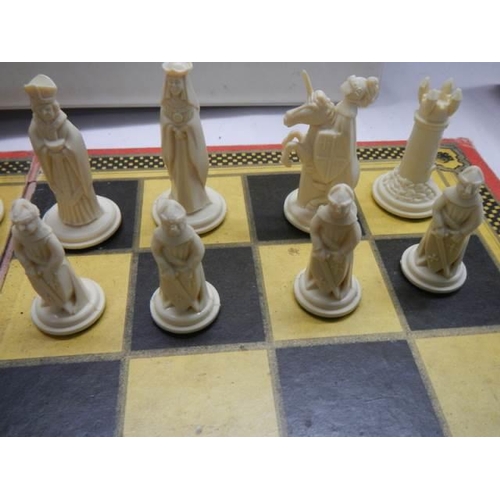 608 - A chess set complete with board.