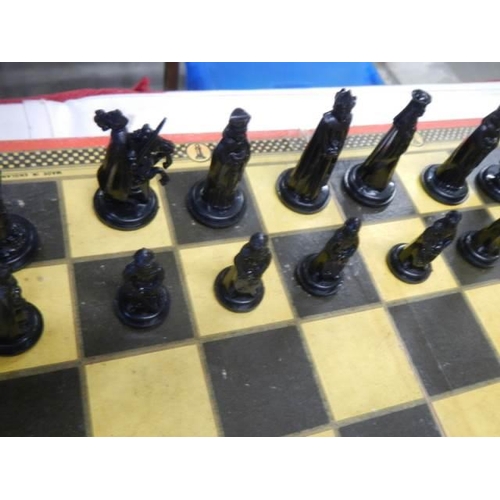 608 - A chess set complete with board.