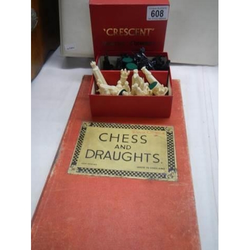 608 - A chess set complete with board.