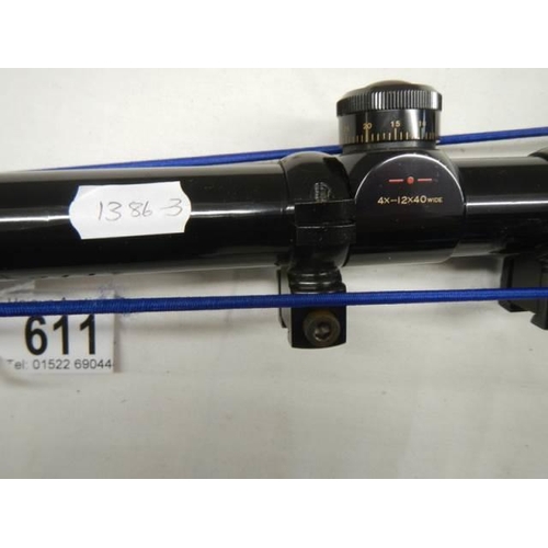 611 - A Rhino electropoint Hakko mark VIII 4x - 12 x 40 rifle scope.