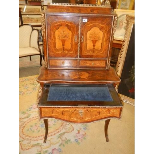 662 - A French marquetry inlaid ladies writing desk with pull out slope. COLLECT ONLY.