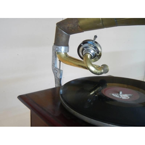 136 - A horn gramophone with brass horn, in working order, COLLECT ONLY.