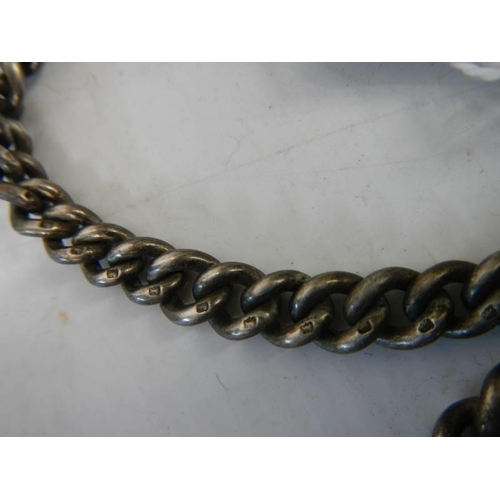 168 - A hall marked silver watch chain with silver fob.