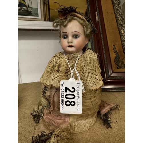 208 - A 19th century German porcelain musical doll, AM10/OXDEP. 3200, not working.